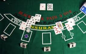 Tampilan Red Tiger di browser iOS menunjukkan meja roulette dengan antarmuka responsif dan tombol navigasi yang jelas